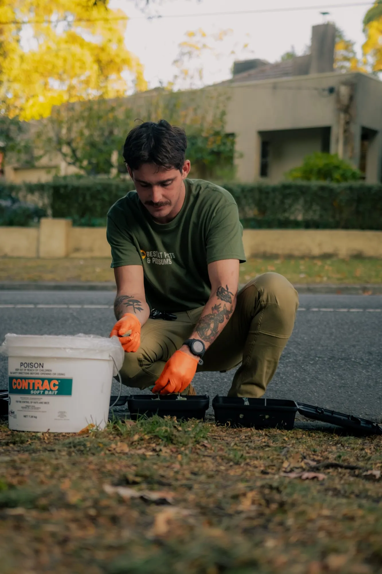 Setting out tamper-proof rodent bait stations