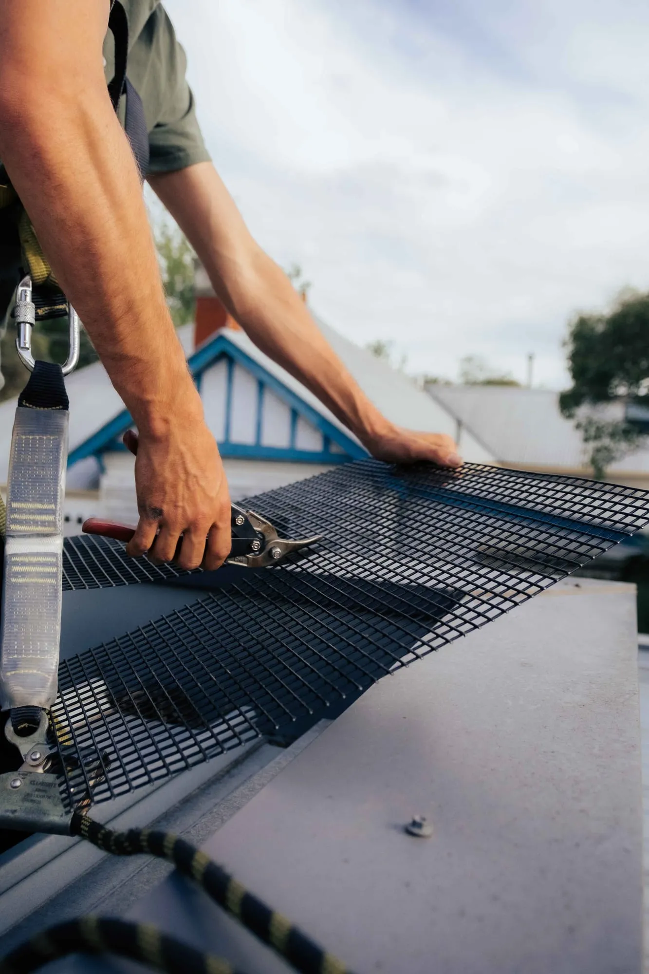 Cutting steel mesh to size for possum proofing