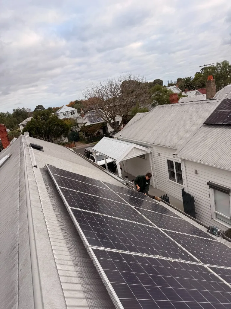Installing solar panel skirting mesh on a Melbourne roof